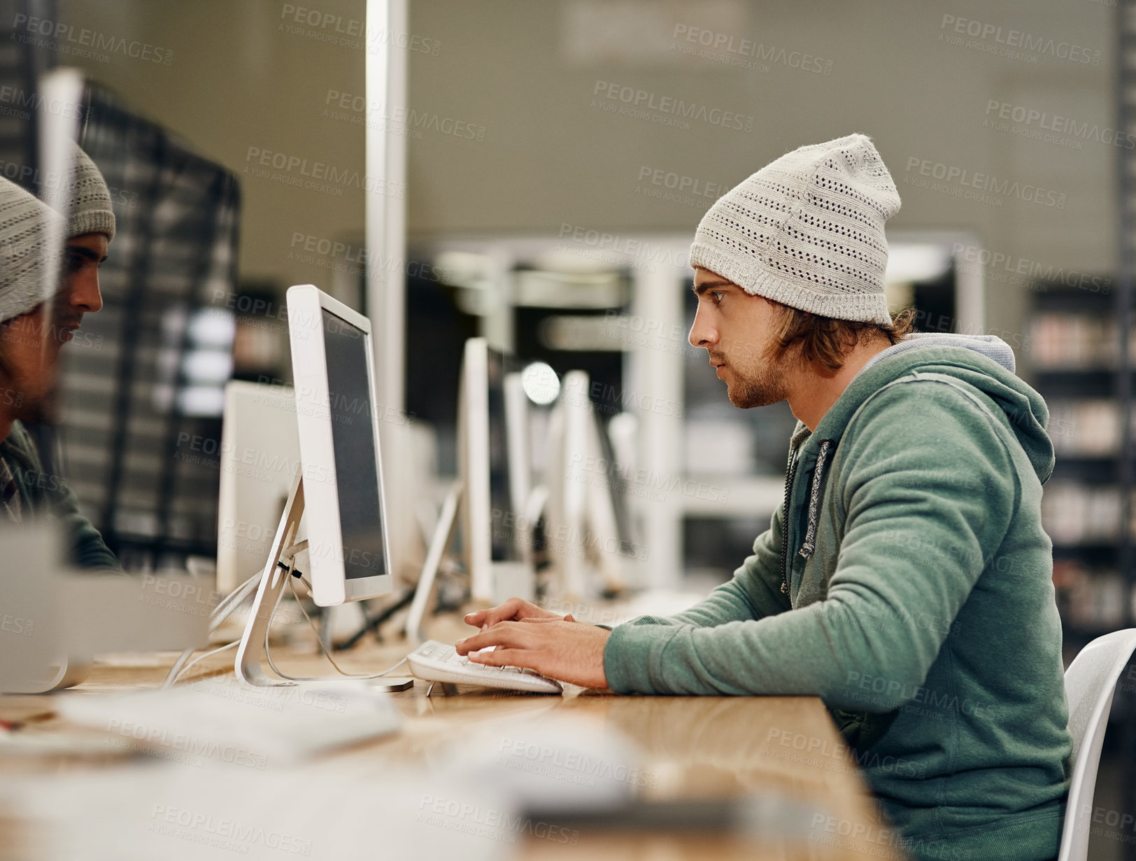 Buy stock photo Student, computer and study in university library for programming course, project and information technology. Classroom, man and learning in college for education, app development and school research