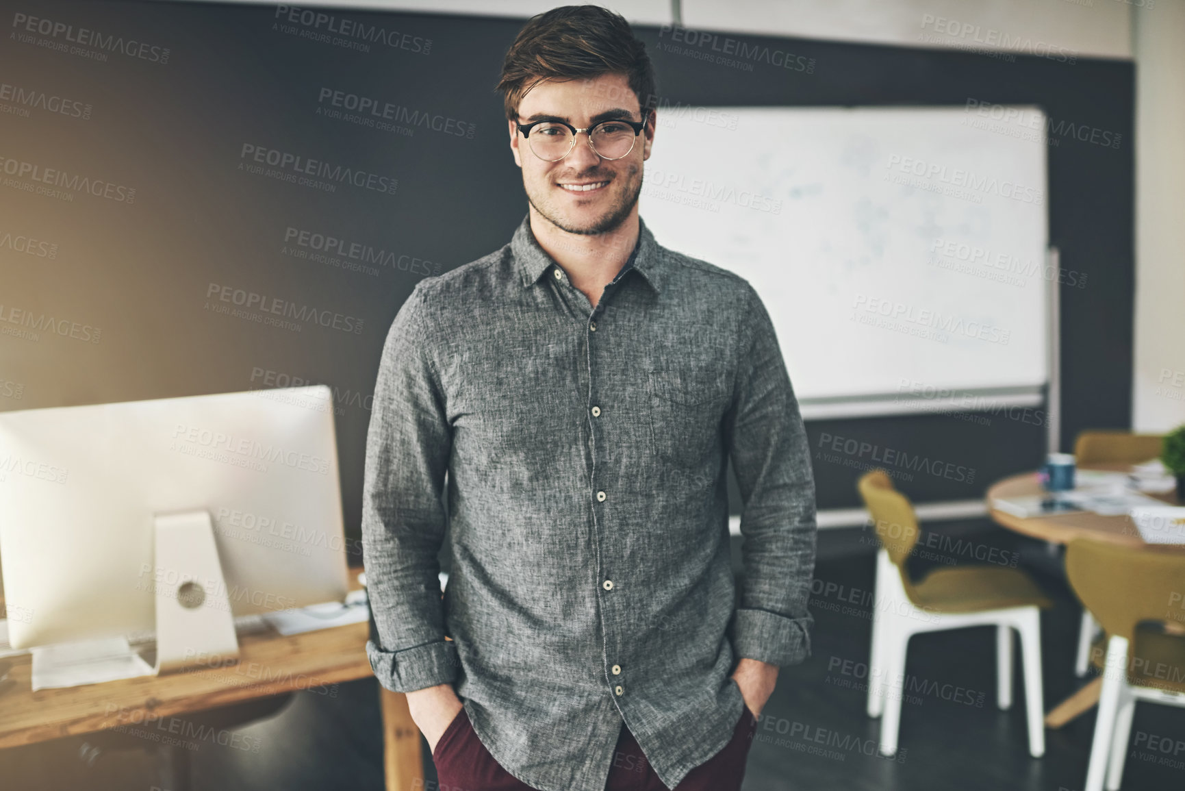 Buy stock photo Shot of a young businessman in the office