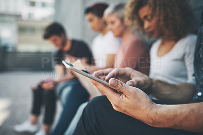 Buy stock photo Shot of a diverse group of people social networking outside