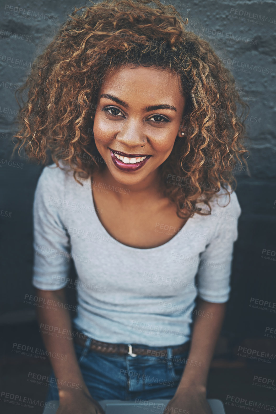 Buy stock photo Portrait of a beautiful young woman outside