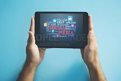 Buy stock photo Hands of a person browsing social media on a tablet screen, checking notifications and reading messages online on the web. Closeup of a man searching the internet and staying connected with tech