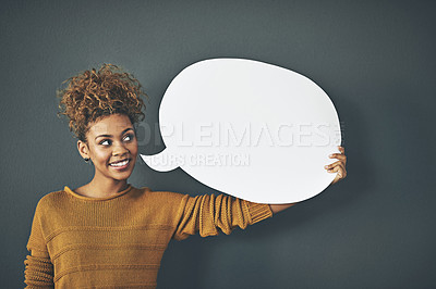 Buy stock photo Woman holding speech bubble, chat board and blank copy space poster for voicing opinions, talking on social media or sharing ideas. Creative speaking about marketing strategy, innovation or vision