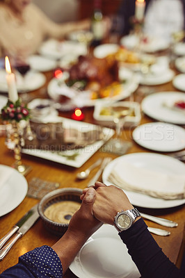 Buy stock photo Prayer, dinner and hand holding with family at table in dining room for holiday, food or praying worship. Celebration, support or gratitude with closeup of people at home for kindness, party and love