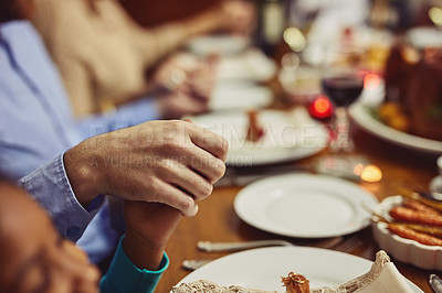 Buy stock photo Prayer, Christmas and hand holding with family at table in dining room for holiday, food or worship. Celebration, support and gratitude with closeup of people at home for kindness, dinner and love