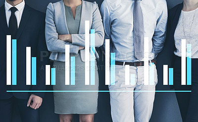 Buy stock photo Studio shot of a group of businesspeople standing in line with cgi graphs superimposed against them