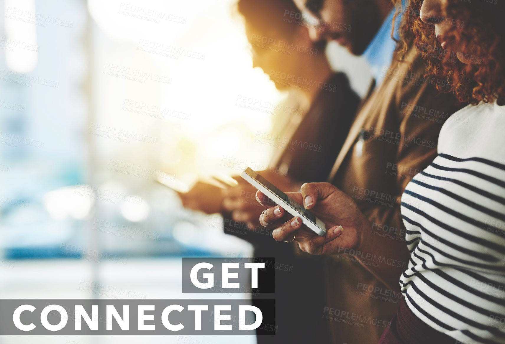 Buy stock photo Shot of a businesspeople using their cellphones with a text overlay on the image