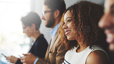 Buy stock photo Shot of a young businesswoman standing with coworker