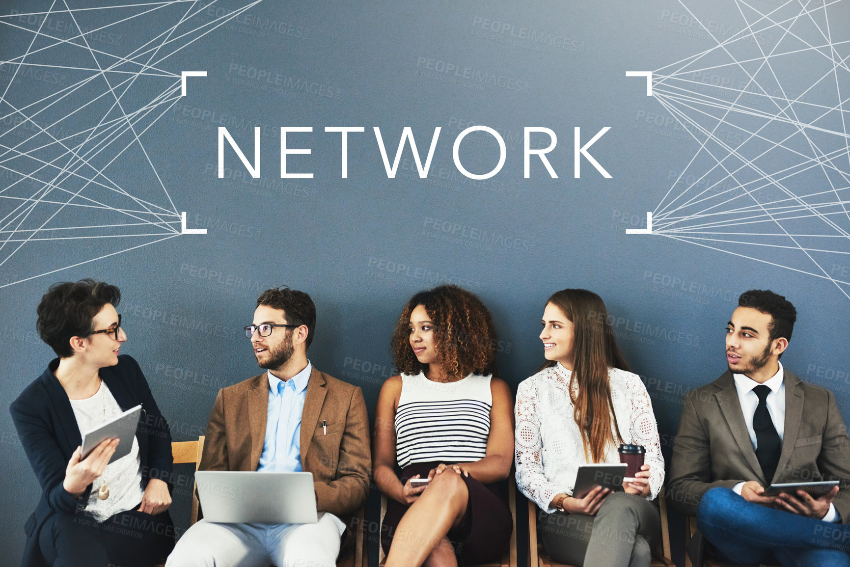Buy stock photo Studio shot of businesspeople using wireless technology in a line with the word network above them against a gray background