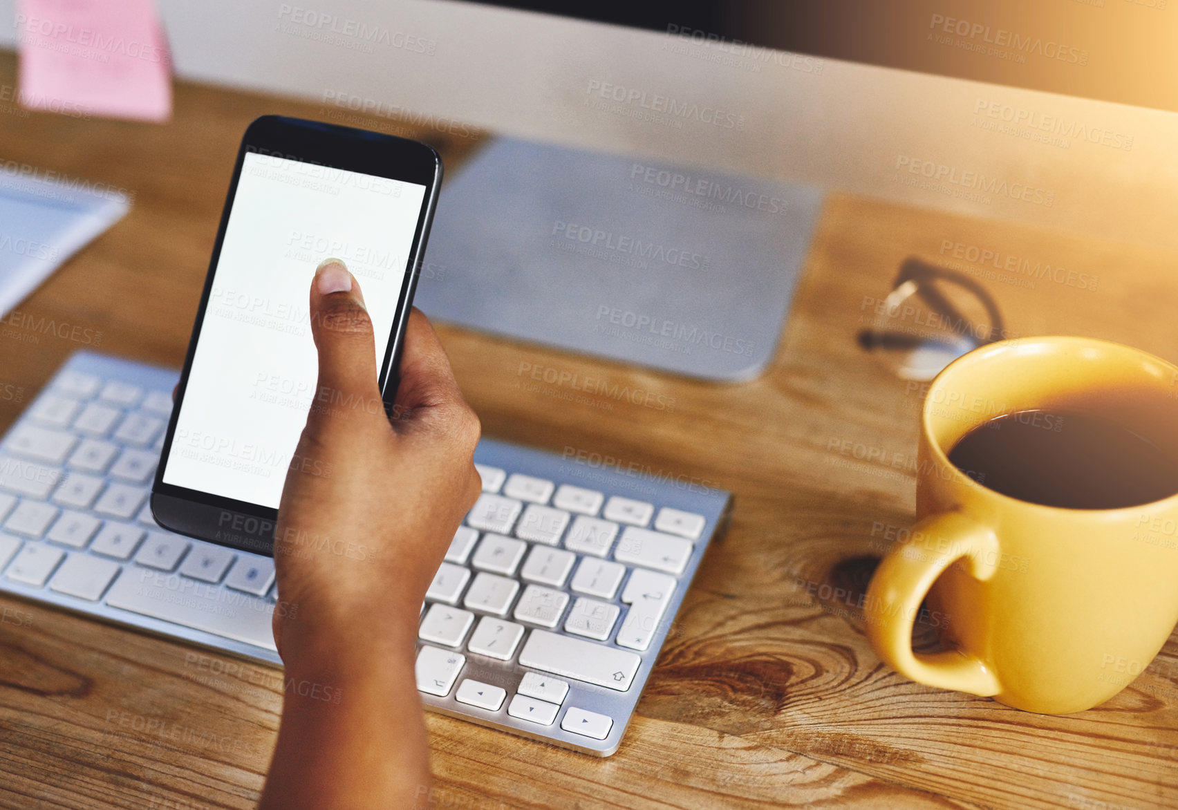 Buy stock photo Phone, hands and person with white screen, computer and work from home with freelancer. Social media, app and notification at desk with online, texting and technology with internet search and mockup