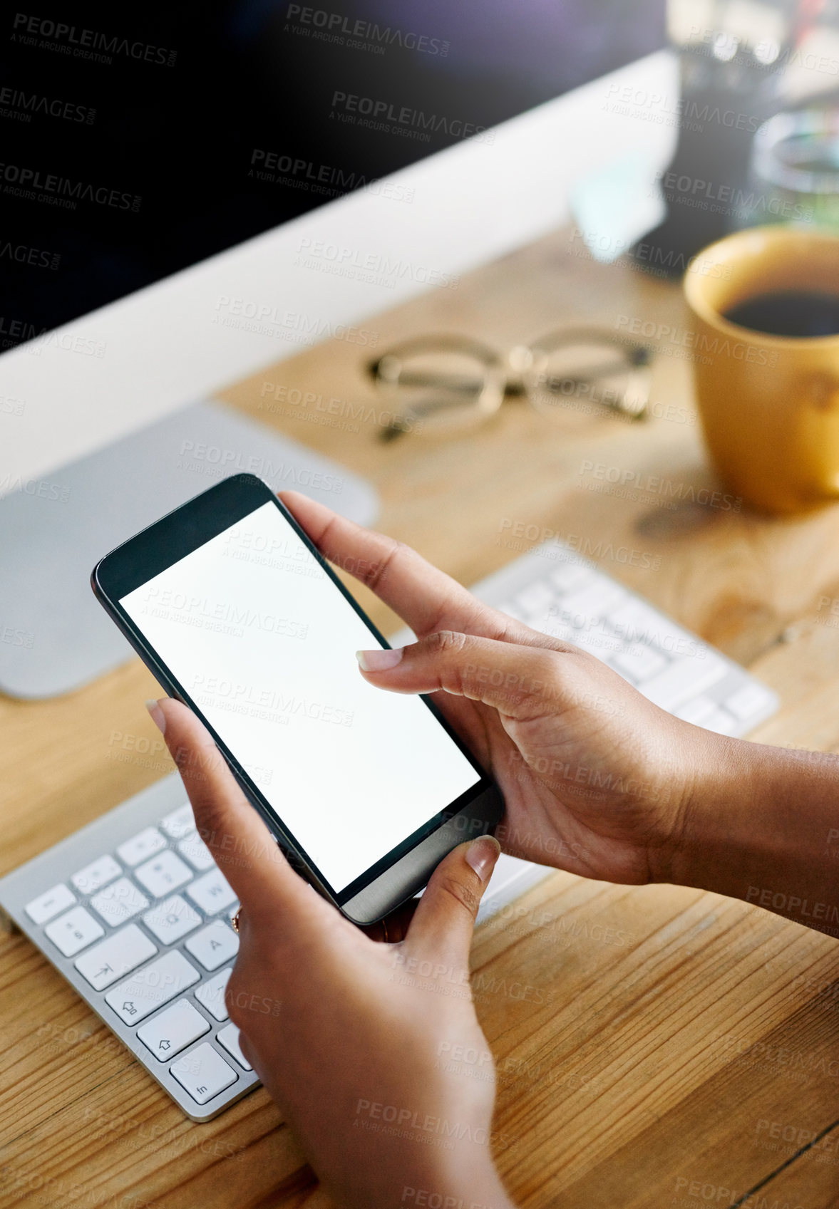 Buy stock photo High angle shot of an unrecognizable businesswoman using a mobile phone