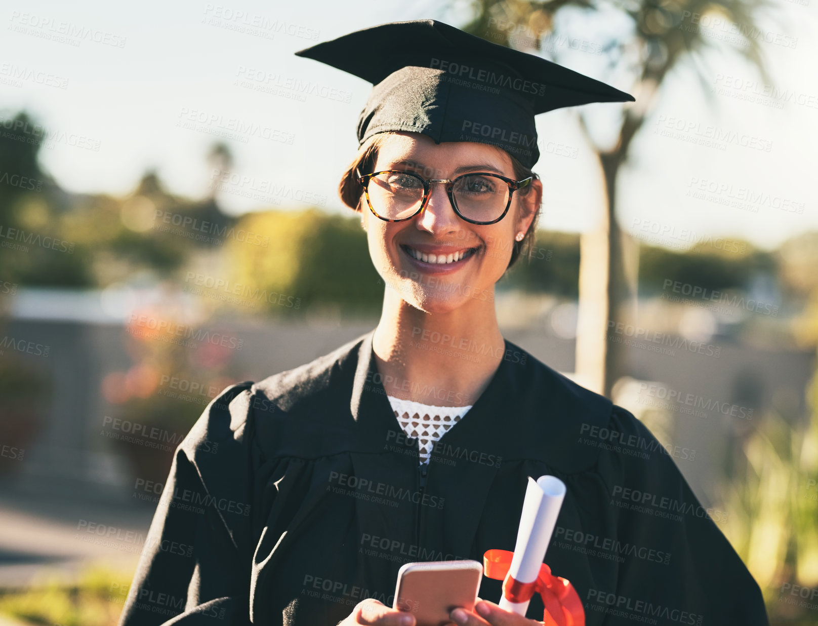 Buy stock photo Portrait, graduate and happy woman with diploma, phone and celebrate success or goal on social media. Face, mobile and student at graduation with certificate scroll for education at college outdoor