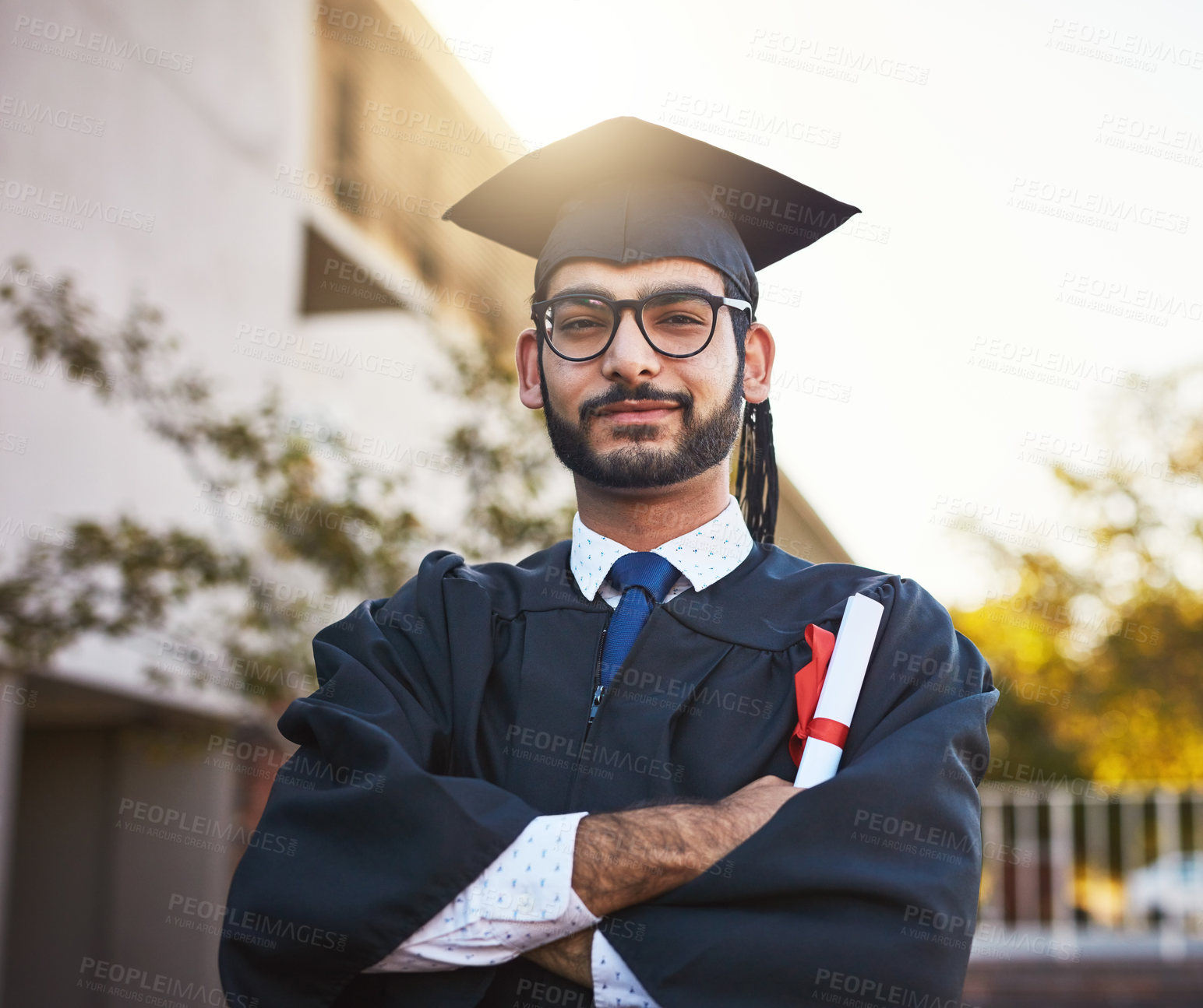 Buy stock photo Portrait, diploma and man with arms crossed for graduation, success or learning goal outdoor. Face, glasses or graduate student with confidence, pride or education certificate for college achievement