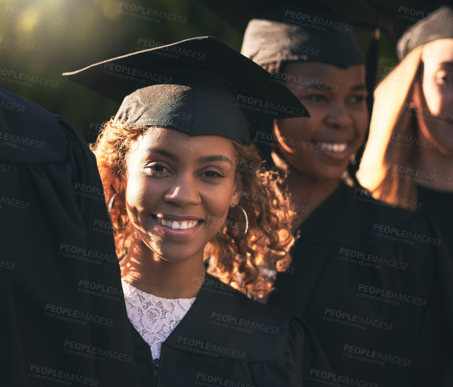 Buy stock photo Celebration, graduation and portrait of student black woman outdoor on campus with friends for ceremony or event. Education, smile and success with face of happy college or university graduate person