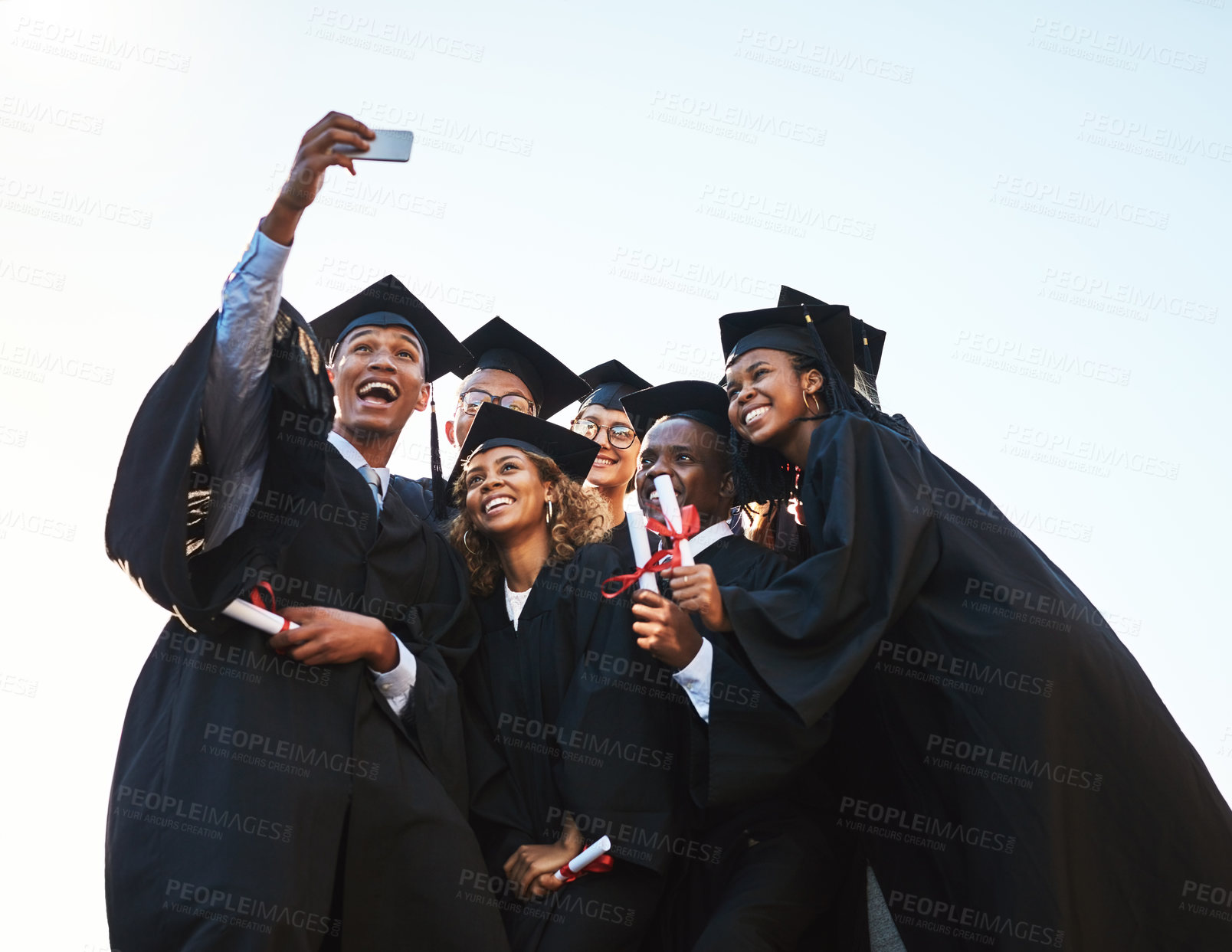 Buy stock photo College, graduation and selfie of student friends outdoor on campus together for ceremony or event. Diversity, success and university with photograph of happy graduate people cheering for future