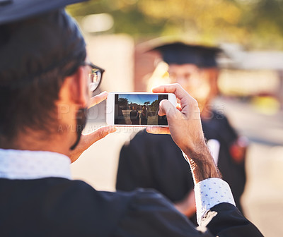 Buy stock photo Phone, screen and students for graduation photography in outdoor, diploma celebration and memory. People, friends and certified together for university success, social media post and support goals