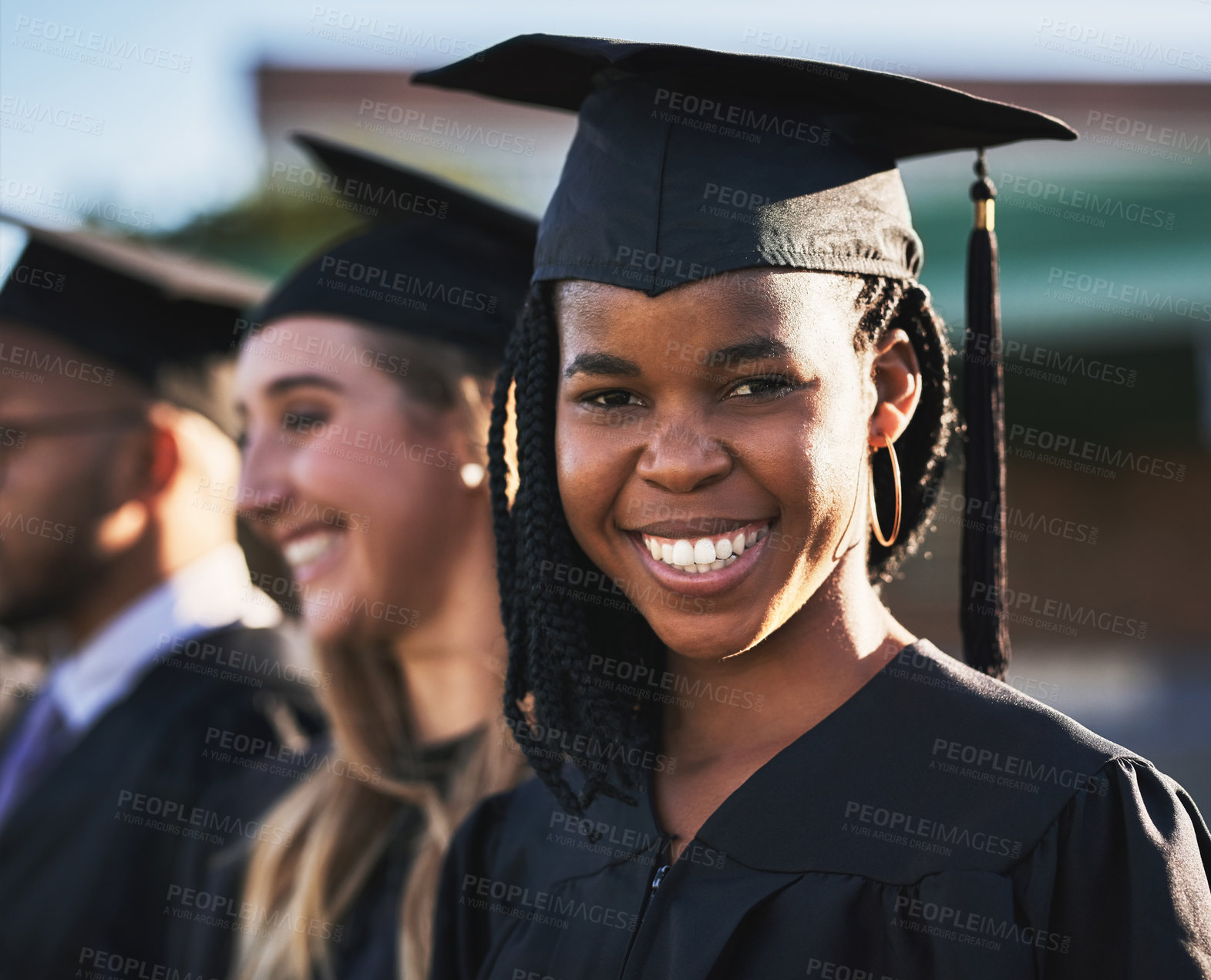 Buy stock photo Woman, students and graduation smile with group class at ceremony for education, qualification or future goals. Portrait of happy person and scholar for diploma, certificate or degree on campus