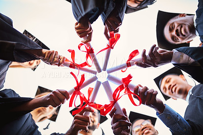 Buy stock photo Graduation, diploma and hands of student team for celebration, award or circle in low angle. People, group or graduate with certificate closeup for education achievement, success or huddle at college