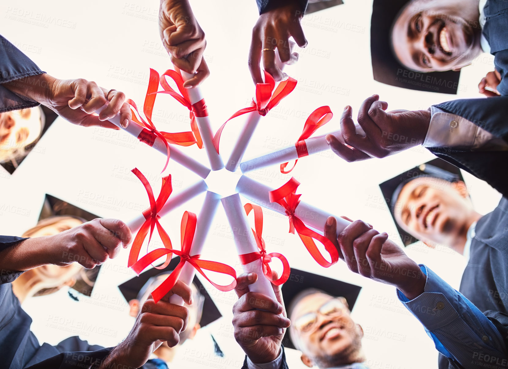 Buy stock photo Graduation, diploma or hands of group for celebration, award or circle in low angle. People, team or graduate students with certificate closeup for education achievement, success or huddle at college