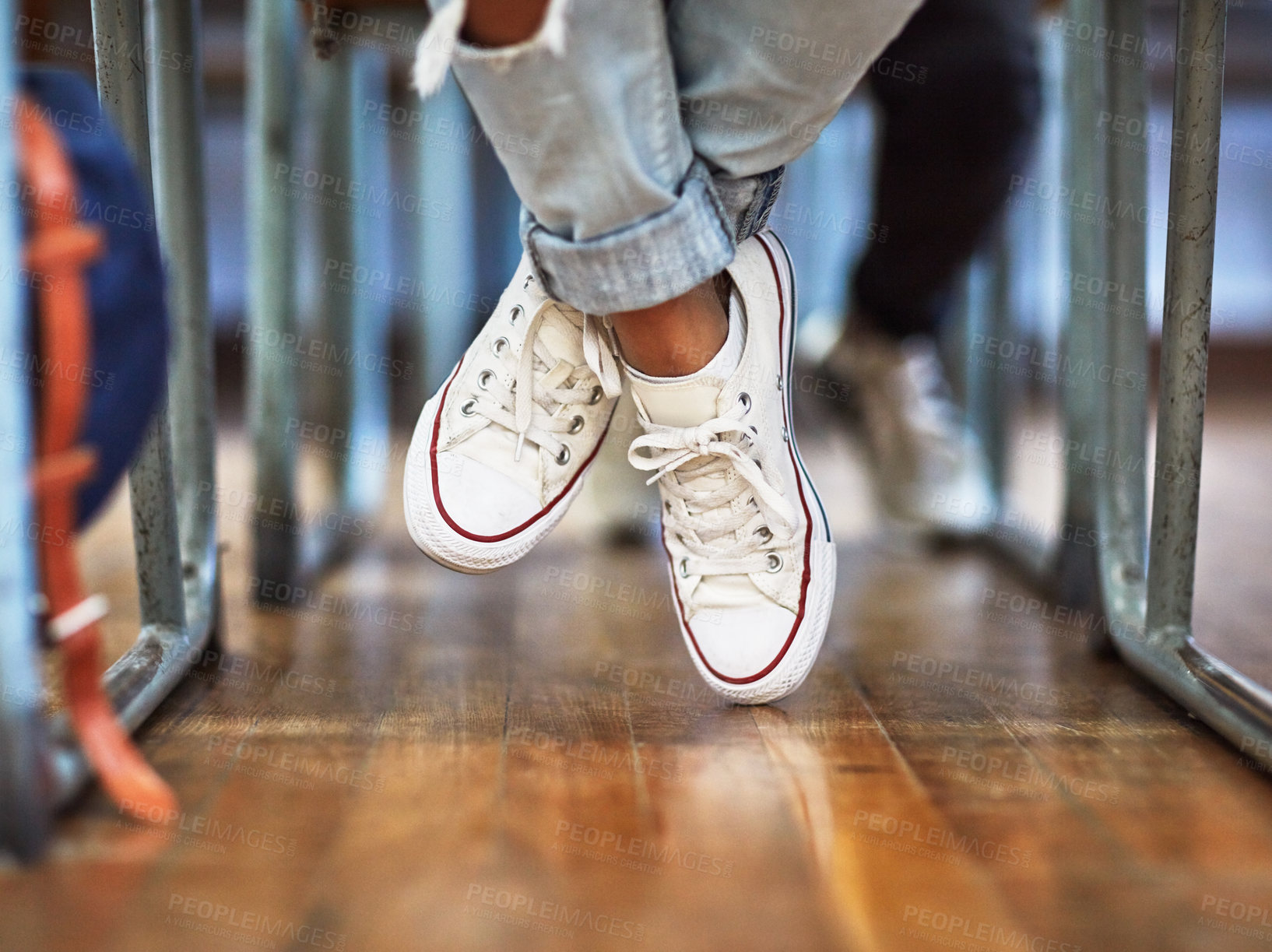 Buy stock photo Student, shoes and school desk with young person at education and knowledge center. Feet, college and under table with university or learning institute classroom with group and sneakers fashion