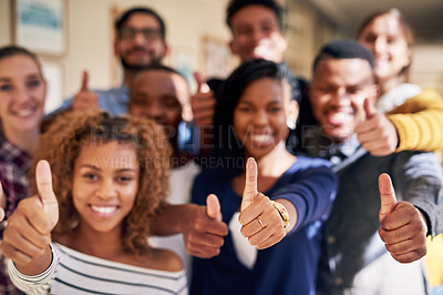 Buy stock photo Portrait of a diverse group of students showing thumbs up at campus