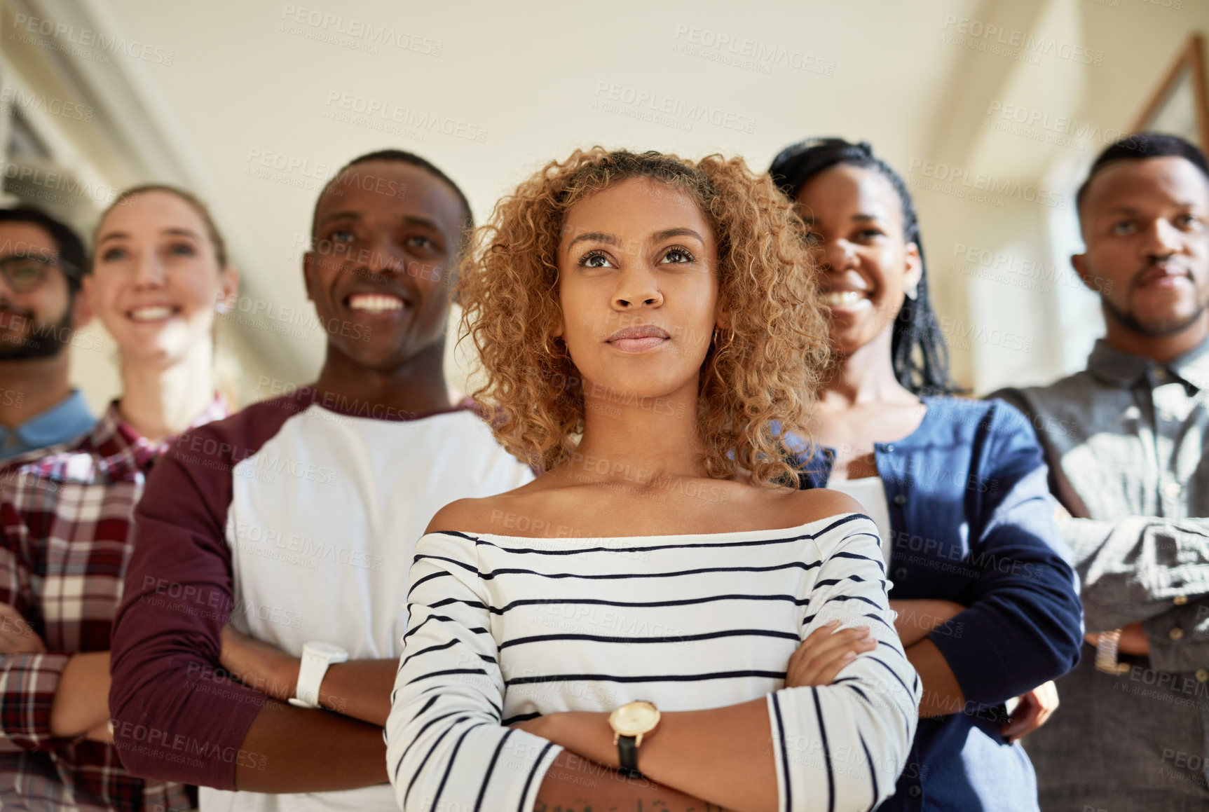 Buy stock photo Shot of a diverse group of students standing together at campus