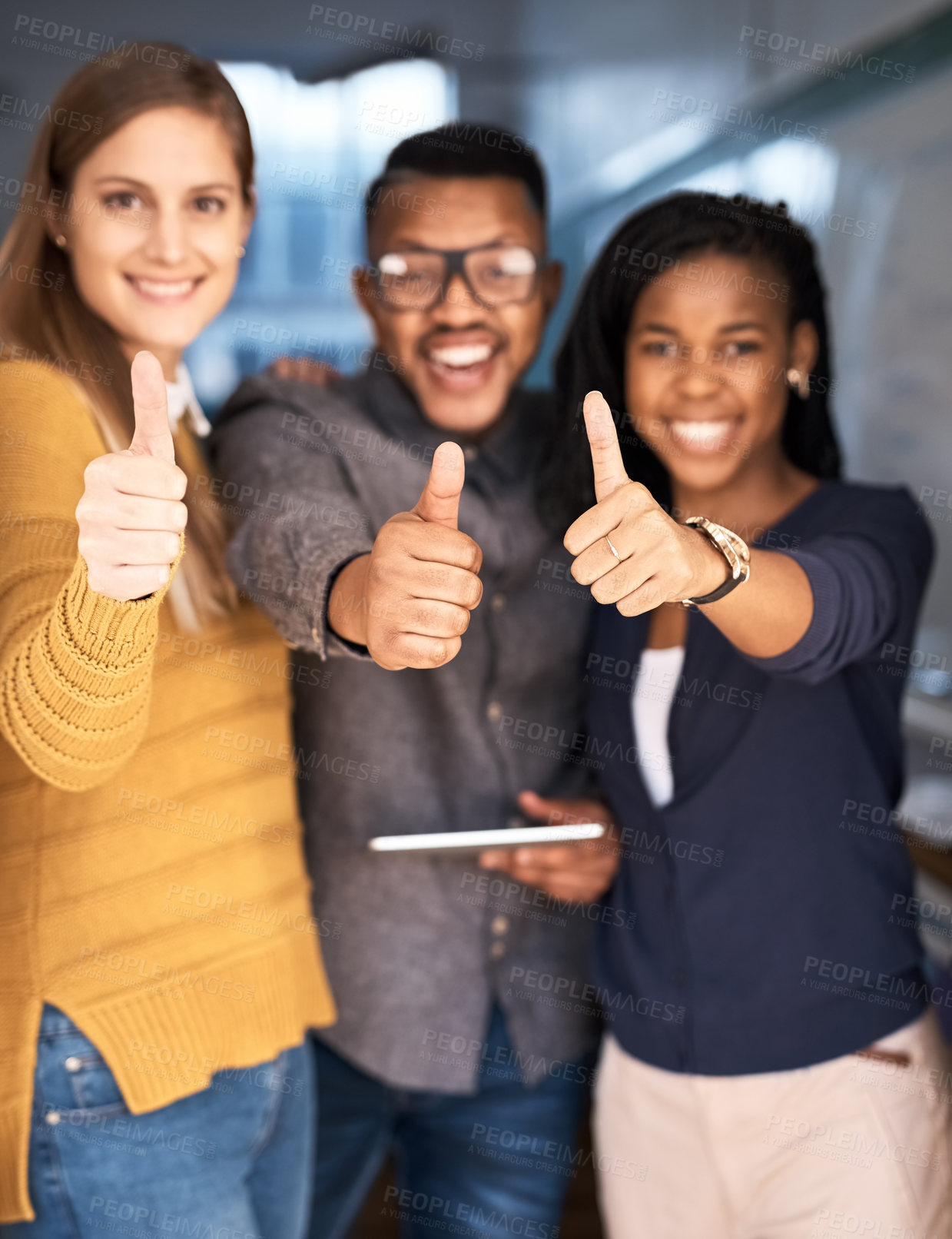 Buy stock photo Cropped shot of university students showing thumbs up in class