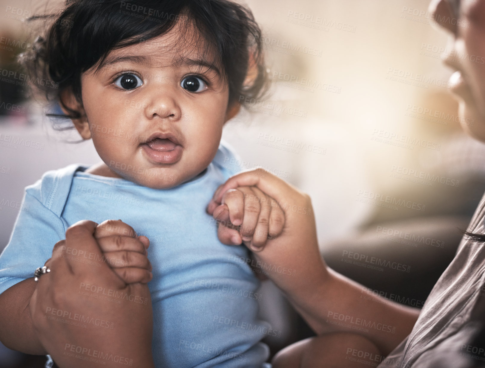 Buy stock photo Portrait of an adorable baby boy playing with his mother at home