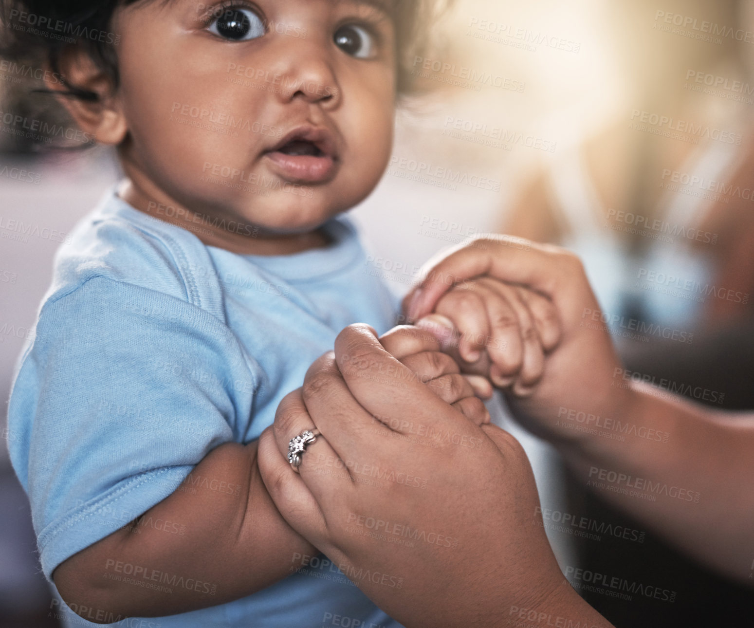 Buy stock photo Child development, growth and single parent holding hands of baby closeup in home for bonding or security. Adorable, love or safety with person and small kid in apartment together for family trust