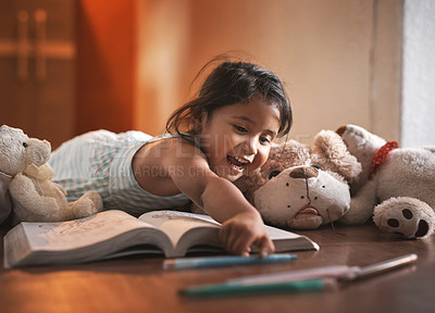 Buy stock photo Excited, kid and girl drawing for homework with learning, development and studying for art skills in home. Young, female child and happy toddler writing on book for creativity, growth and education