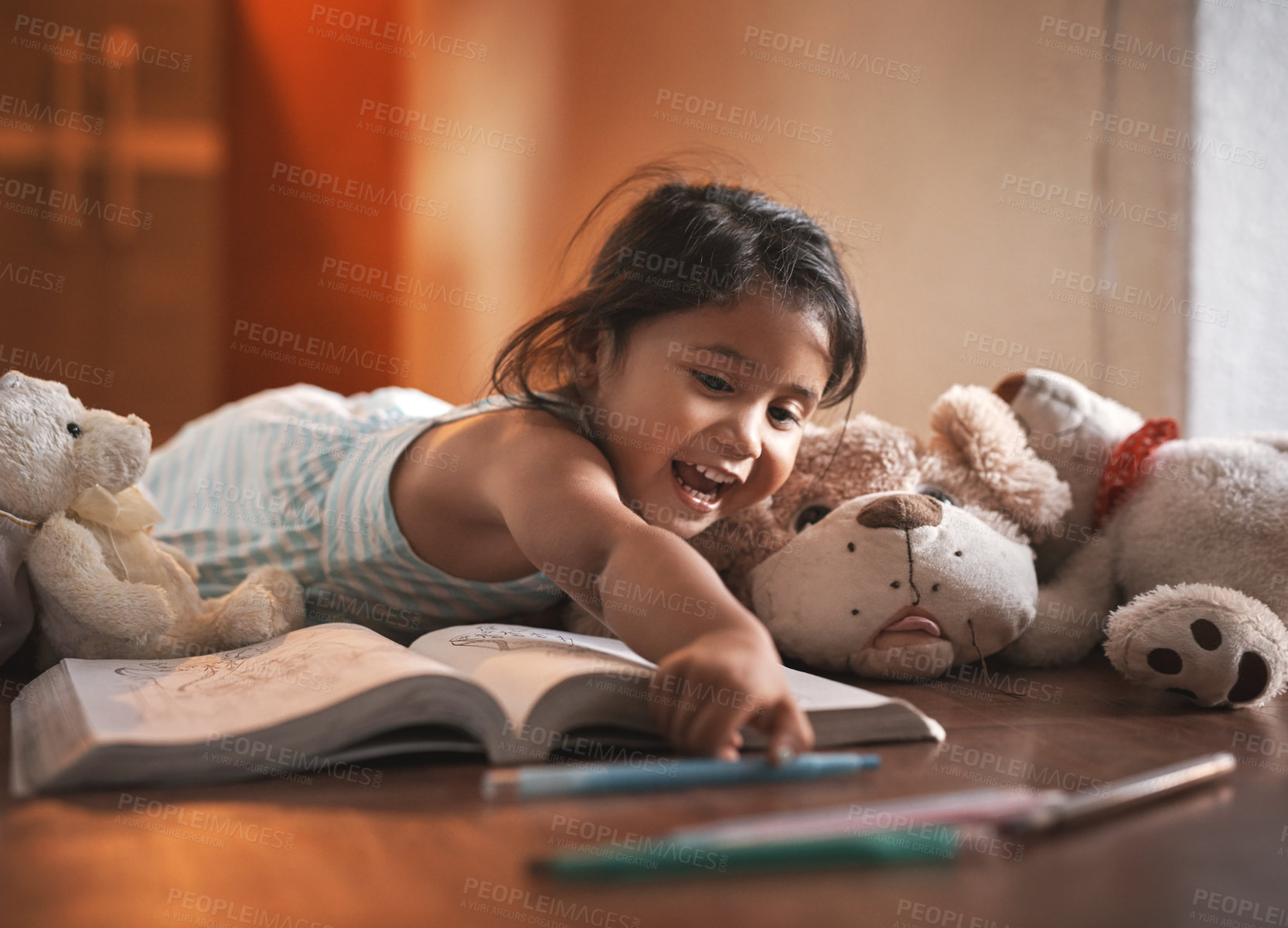 Buy stock photo Excited, kid and girl drawing for homework with learning, development and studying for art skills in home. Young, female child and happy toddler writing on book for creativity, growth and education