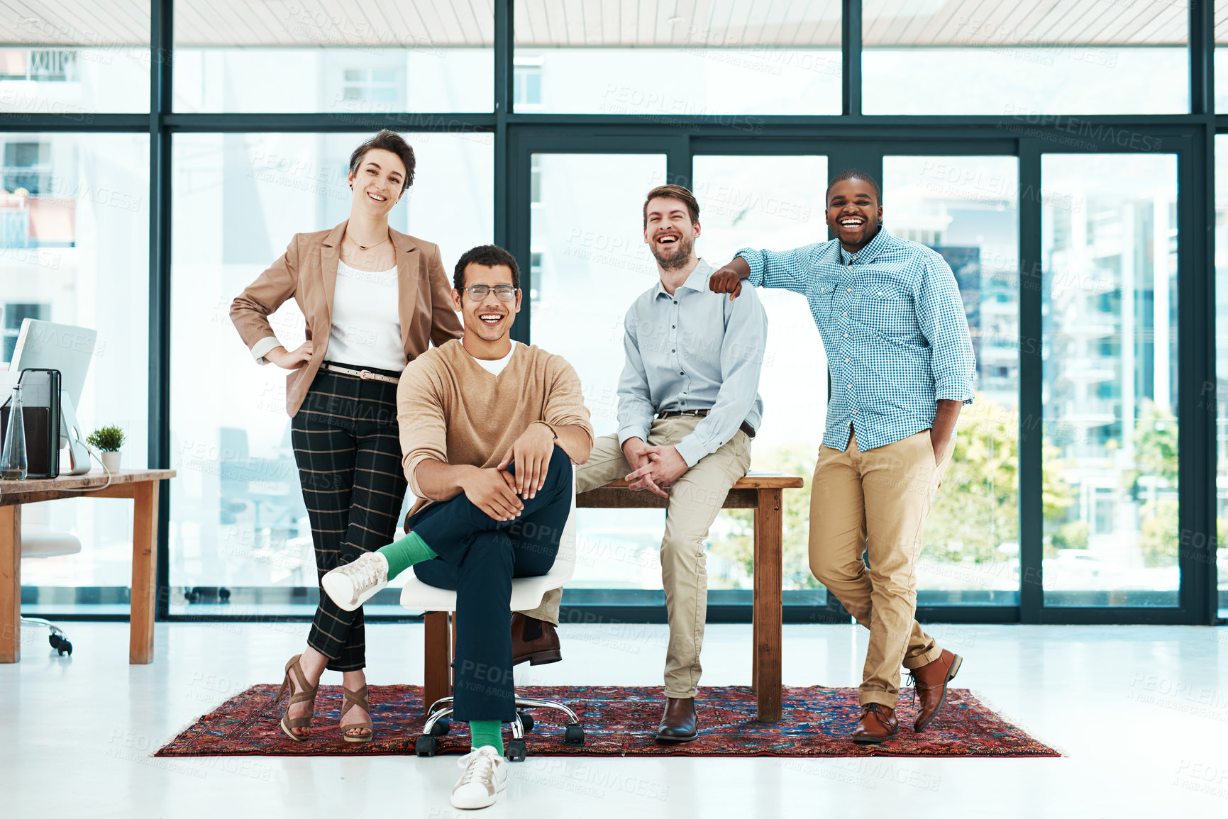 Buy stock photo Portrait of a group of young designers standing together