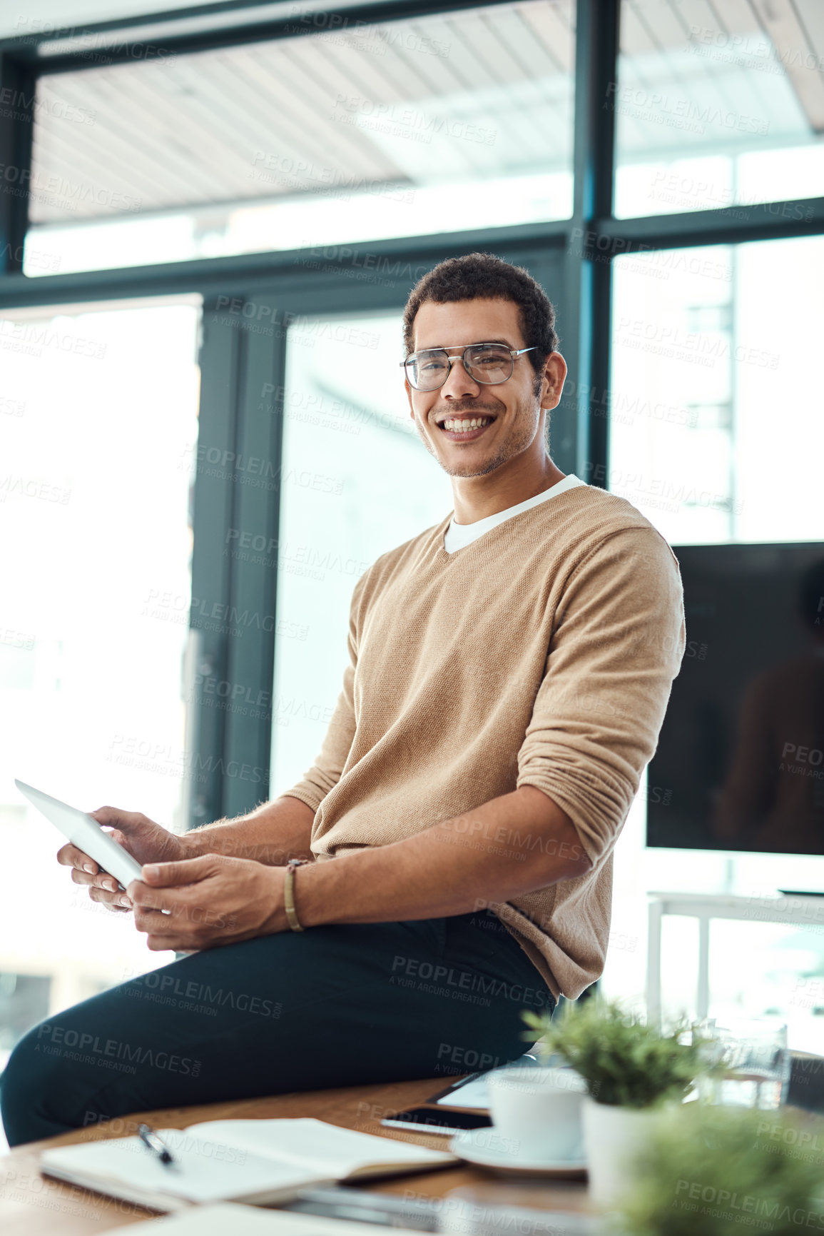 Buy stock photo Happy, businessman and portrait with tablet on desk by website design company for brand identity. Male employee, online and smile in workplace for programming, review or project management in office.