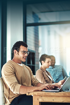 Buy stock photo Cropped shot of young designers in their workplace