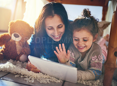 Buy stock photo Home, mother and girl with tablet, video call and social media with happiness, communication and love. Family, parent and mama with daughter, tech and digital app for connection, talk or conversation