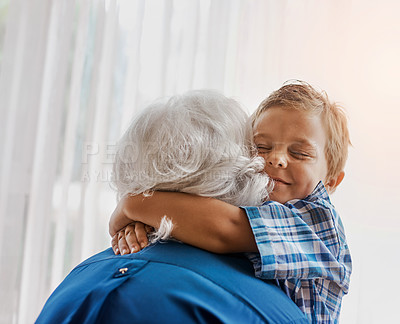 Buy stock photo Cropped shot of a senior woman spending time with her loving grandson