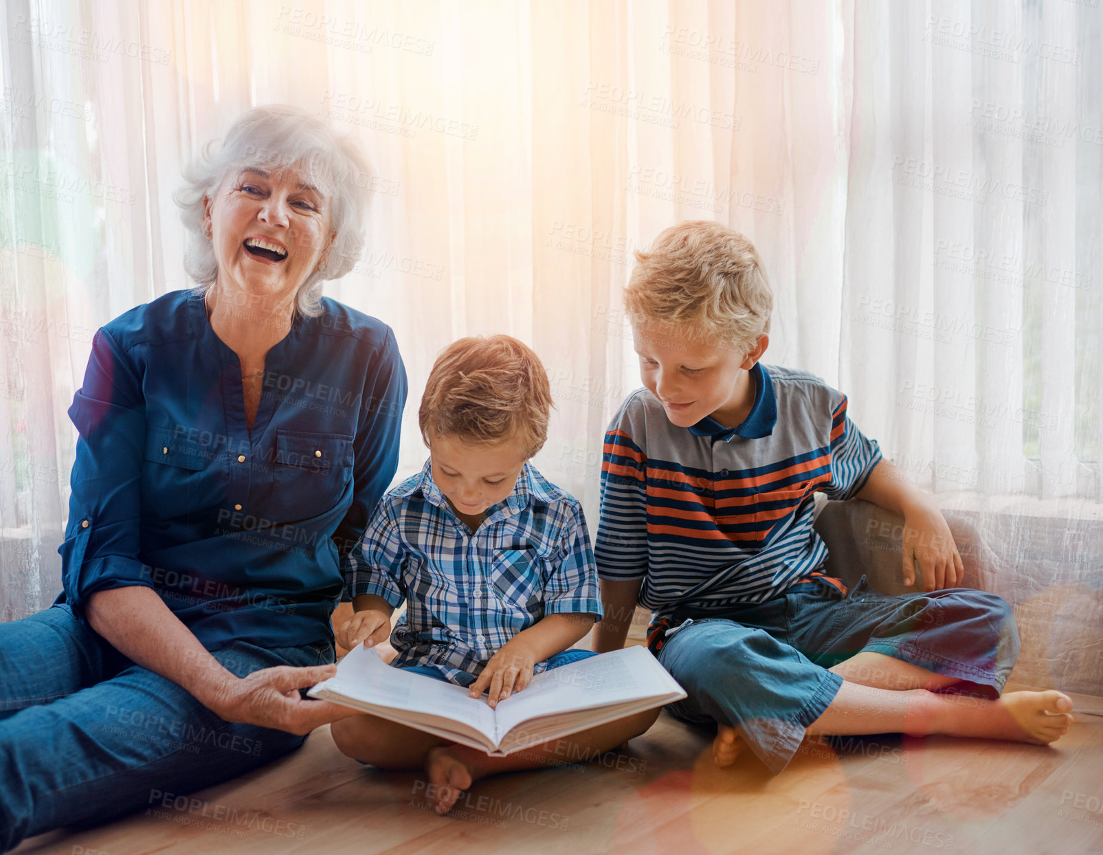 Buy stock photo Reading, book and grandmother with children on floor in home for bonding, learning or knowledge. Happy, relax and portrait of senior woman with boy kids enjoying fantasy novel, story or literature.