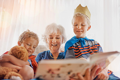 Buy stock photo Shot of a senior woman spending time wither her grandsons