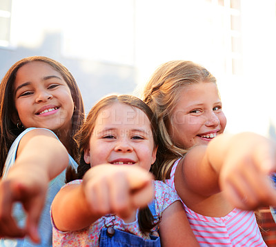 Buy stock photo Portrait of a group of young children pointing together outside