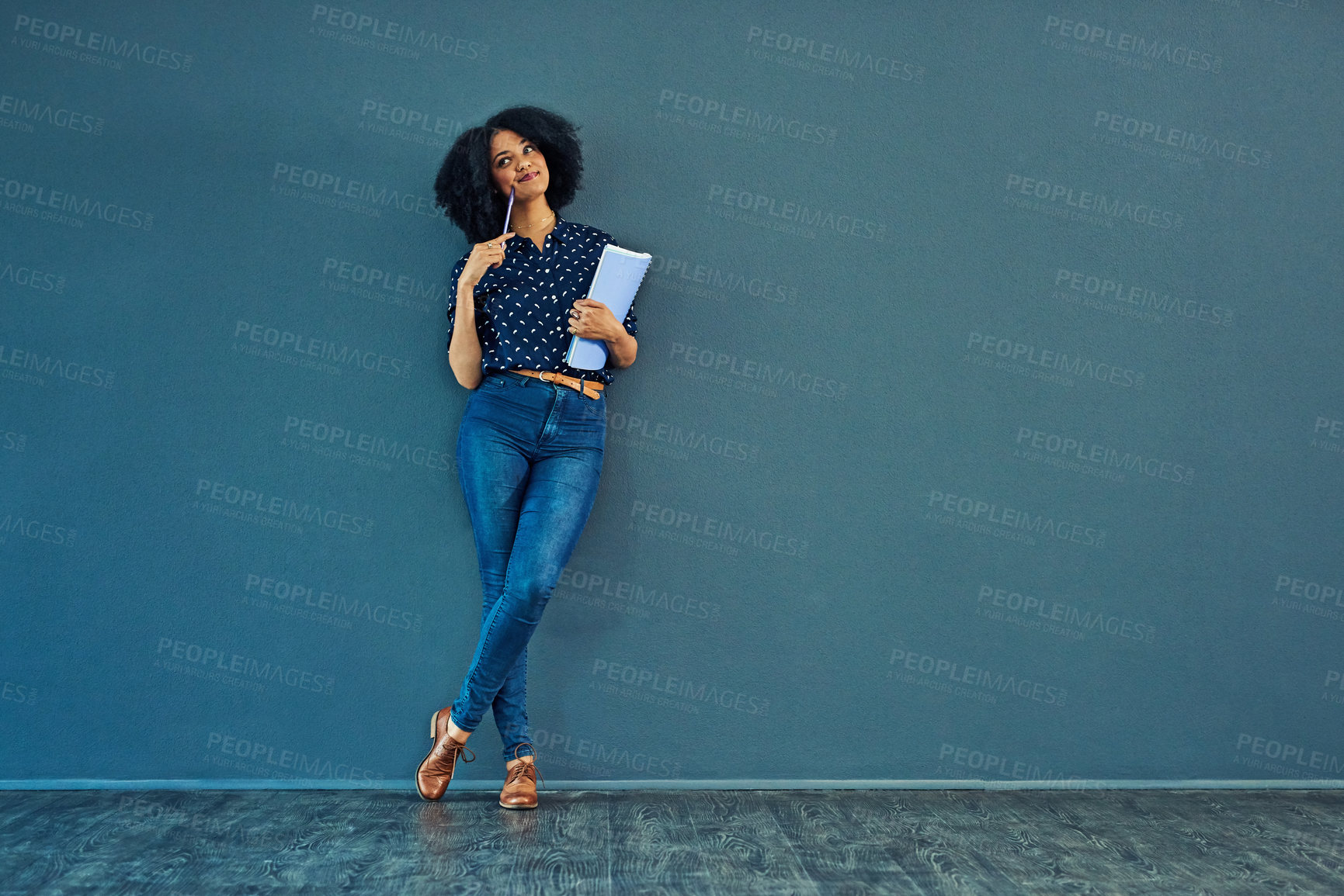 Buy stock photo Thinking, planning and woman on a blue wall for business, career ideas or plan in an office. Smile, corporate and a young female employee with a notebook and idea or professional strategy with mockup