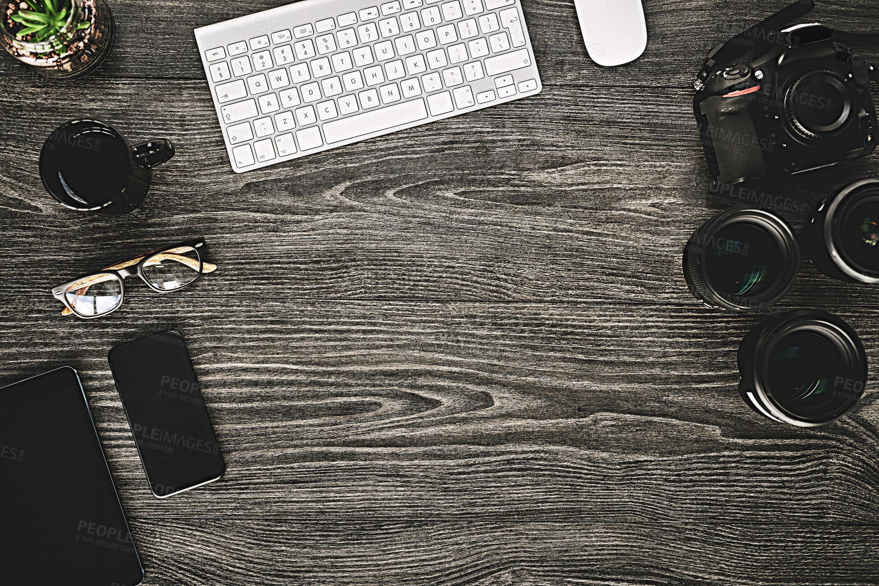 Buy stock photo High angle shot of a photographer's work desk