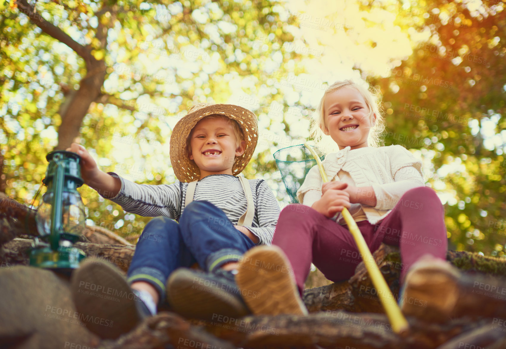 Buy stock photo Portrait of two little children playing together outdoors