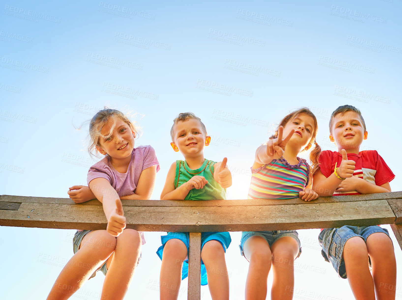 Buy stock photo Friends, children and portrait with thumbs up outdoor, park and garden by wooden bridge in nature. Happy kids, boys and girls with peace, playful and bonding together for childhood development