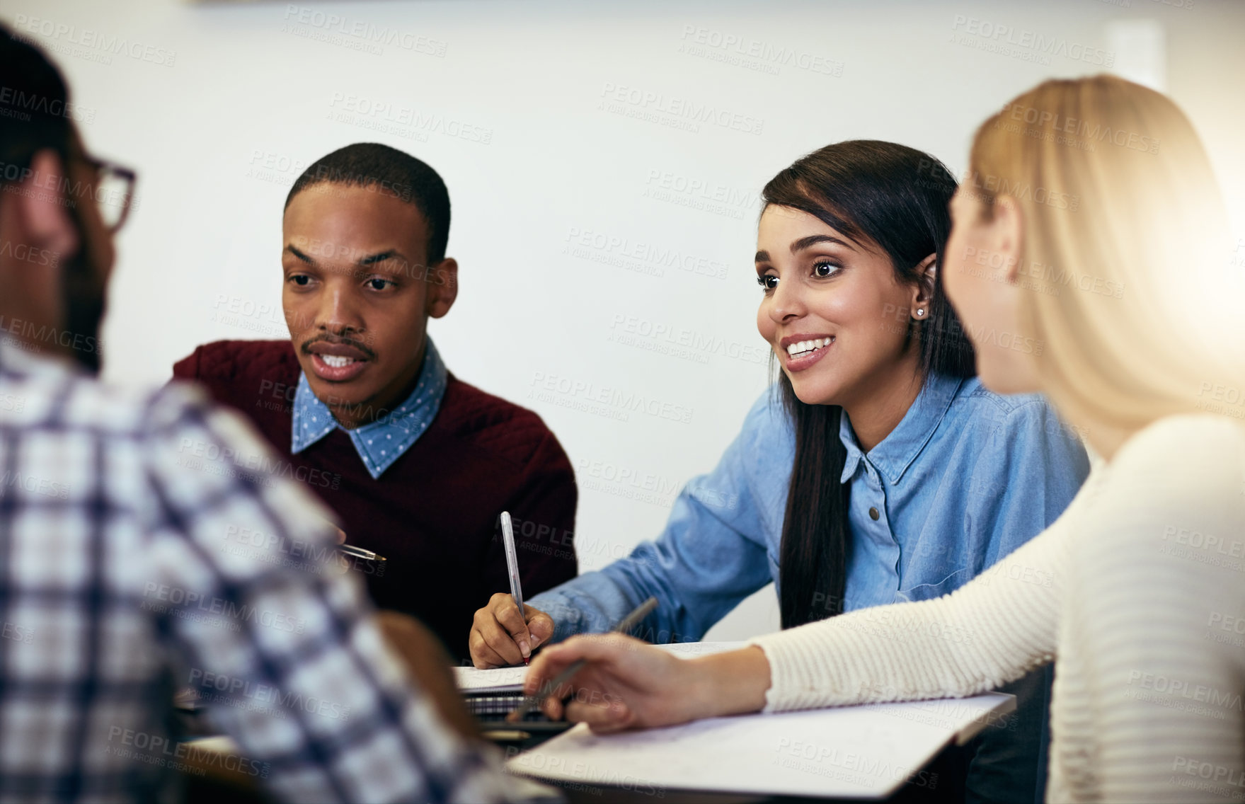 Buy stock photo Writing, discussion and people in study group for university project, education or scholarship course. Teamwork, support and college students with notes for exam, learning and planning for research