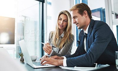 Buy stock photo Man, woman and partnership with research, laptop and typing with help, explain and coaching in workplace. Businessman, female partner and computer for business goal, teamwork or training at job