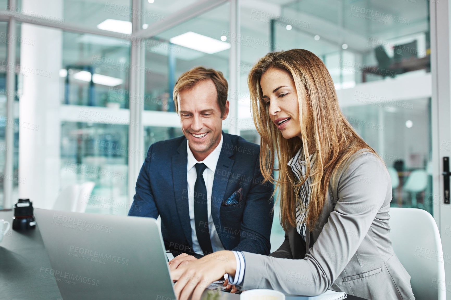 Buy stock photo Happy man, woman or laptop in office for research, business review or advice for company growth. Team, tech or meeting in workplace for feedback, information or budget planning for financial year end