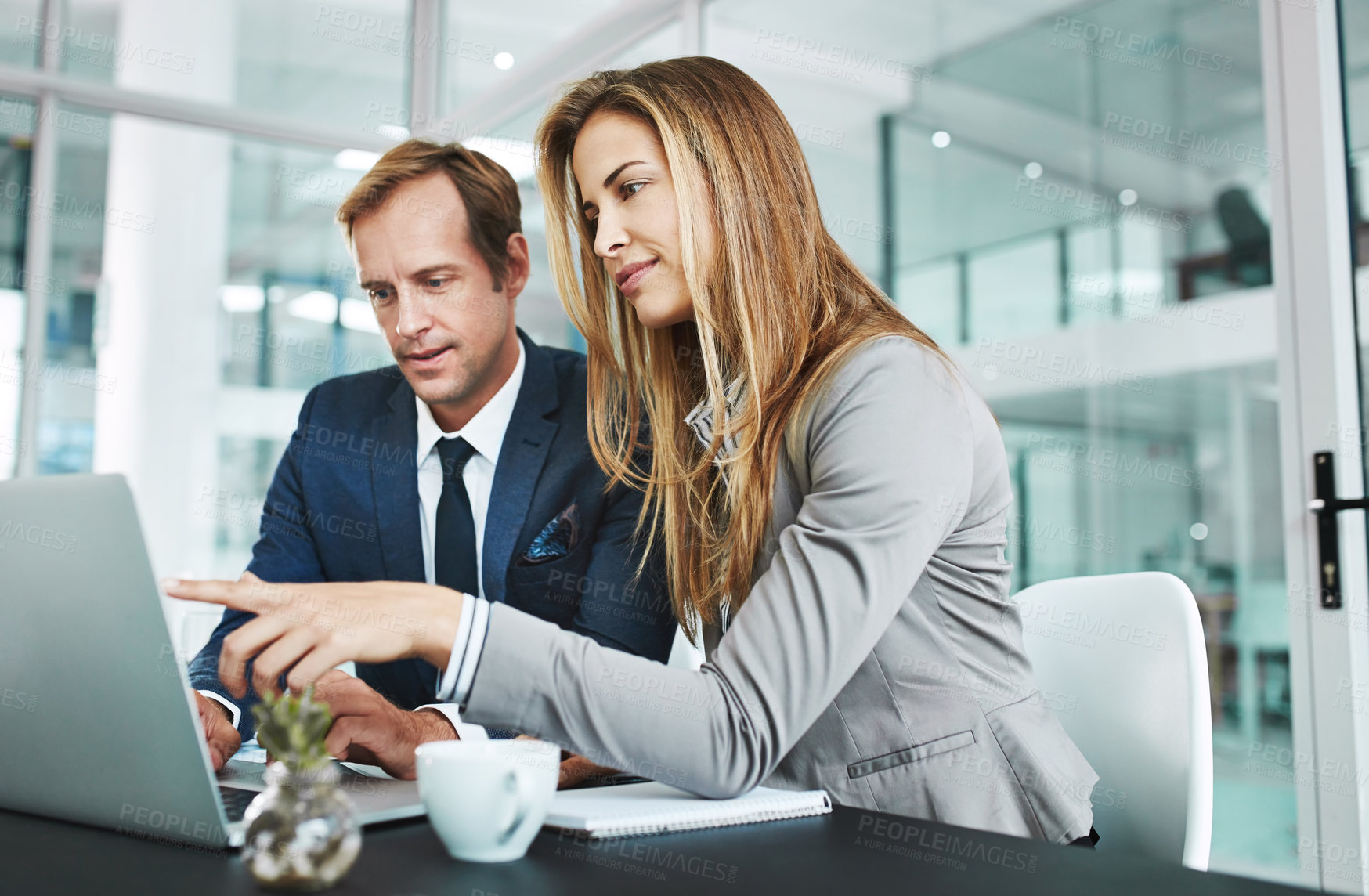 Buy stock photo Man, woman and laptop on office for discussion, meeting and advice for company growth. People, business and computer in workplace for teamwork, brainstorming or budget planning for financial year end