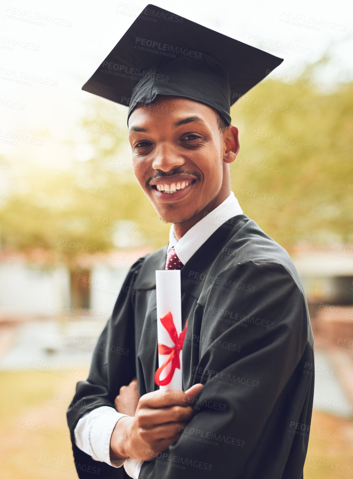 Buy stock photo Happy black man, portrait and graduate with certificate for qualification, graduation or diploma at university. Young African, male person or student with smile for degree or academic achievement