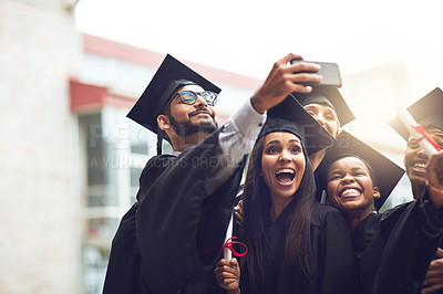 Buy stock photo Graduation, college and selfie with excited students for celebration, achievement and success in education. Photography, friends and happy people on university campus with diploma at award ceremony