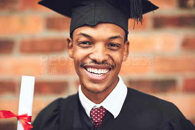 Buy stock photo Cropped shot of a happy young graduate standing outside