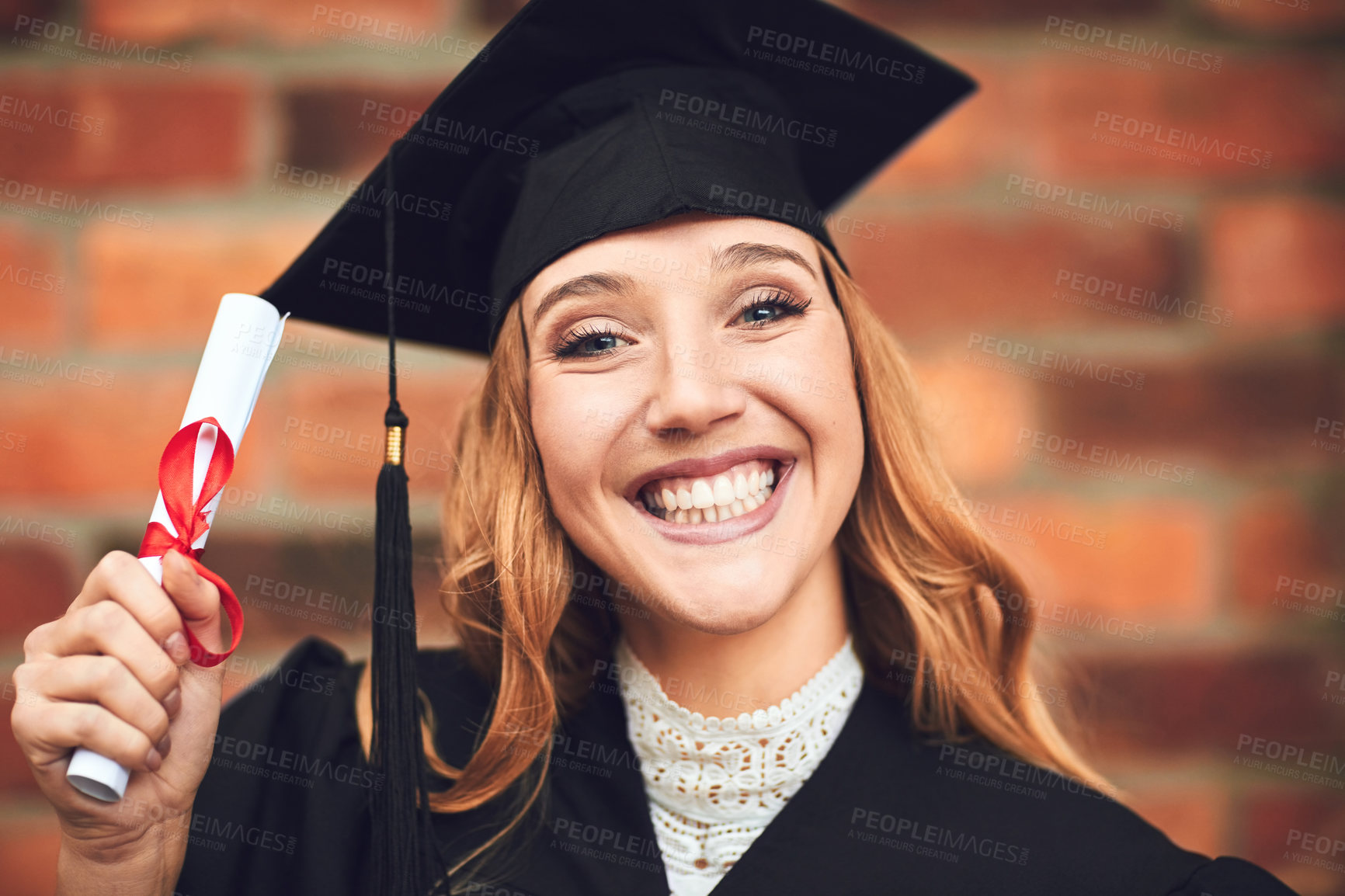 Buy stock photo Graduation, university and portrait of happy woman with certificate, success or achievement in education. Smile, face or student on college campus with law school diploma for legal career opportunity